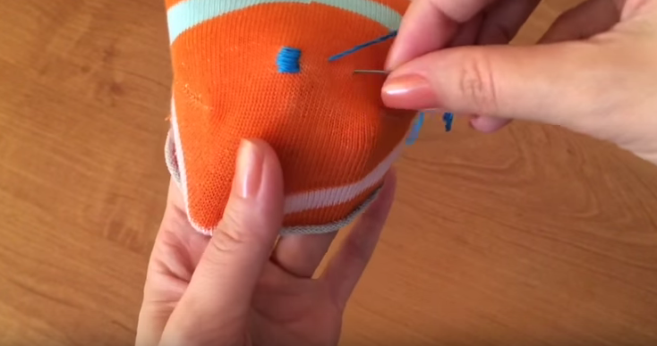 embroidery face of a sock toy.png