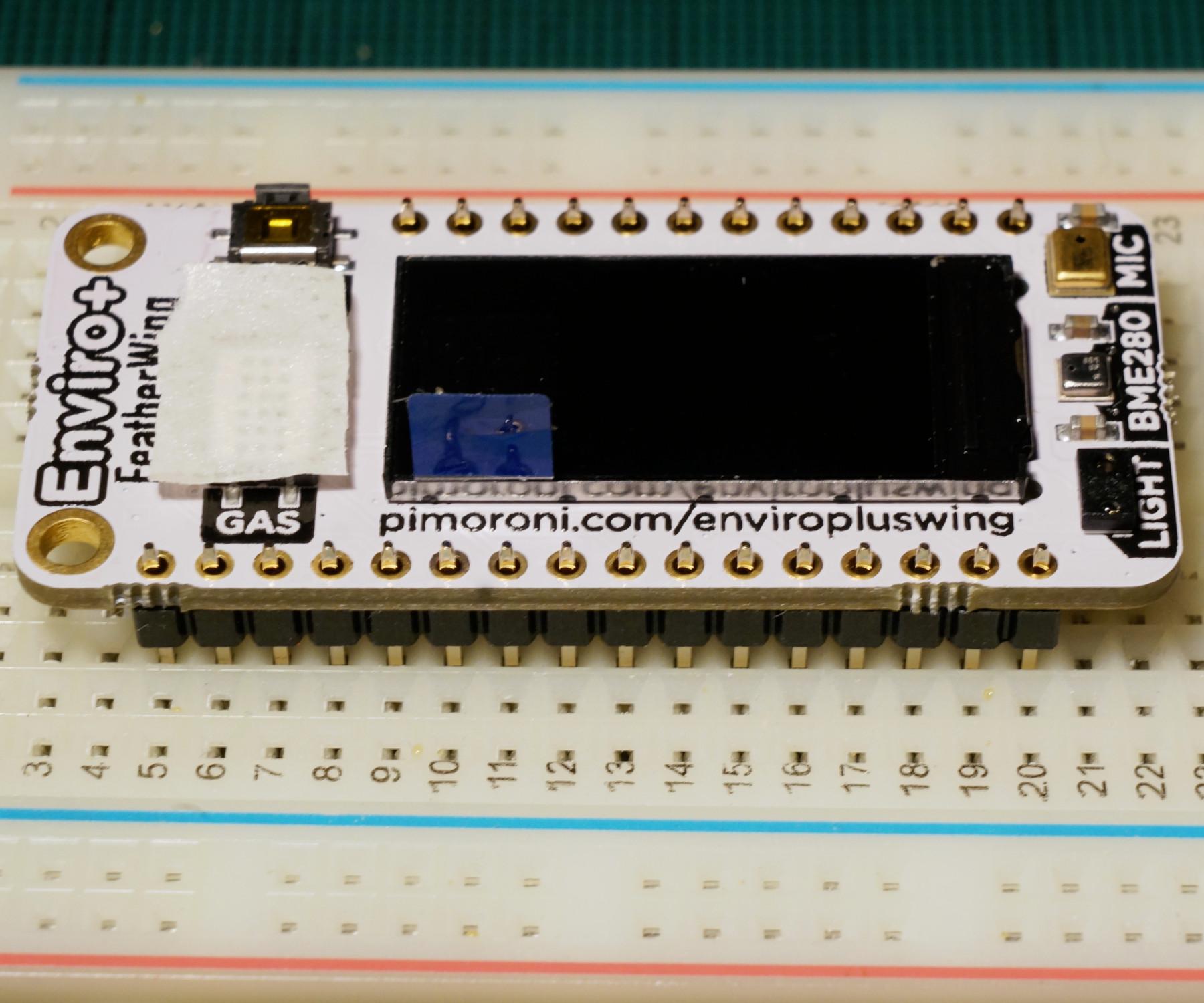 enviroplusfeatherwing-soldering-breadboard-raisedpins.jpg