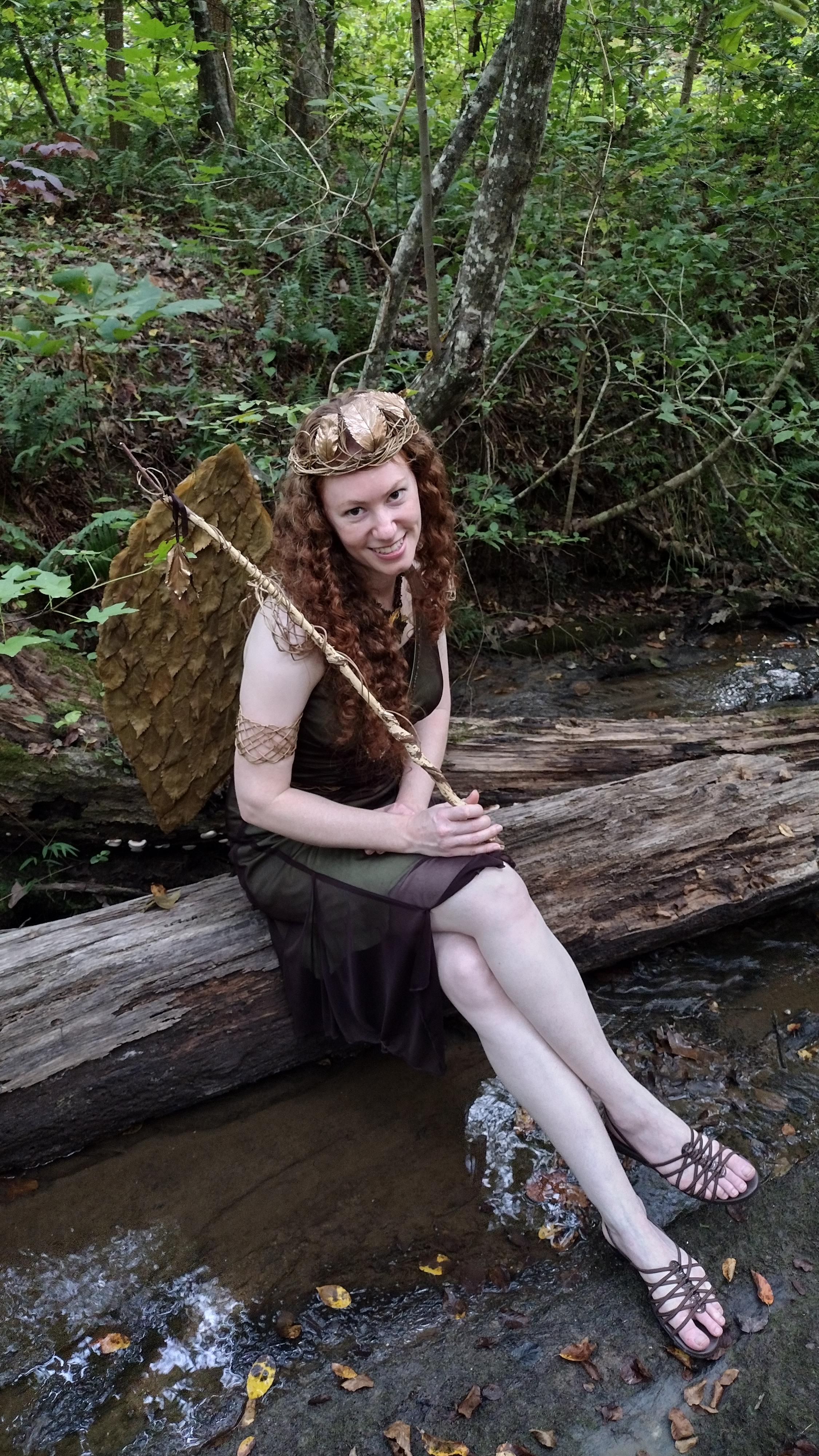 fairy sitting on log in creek.jpg