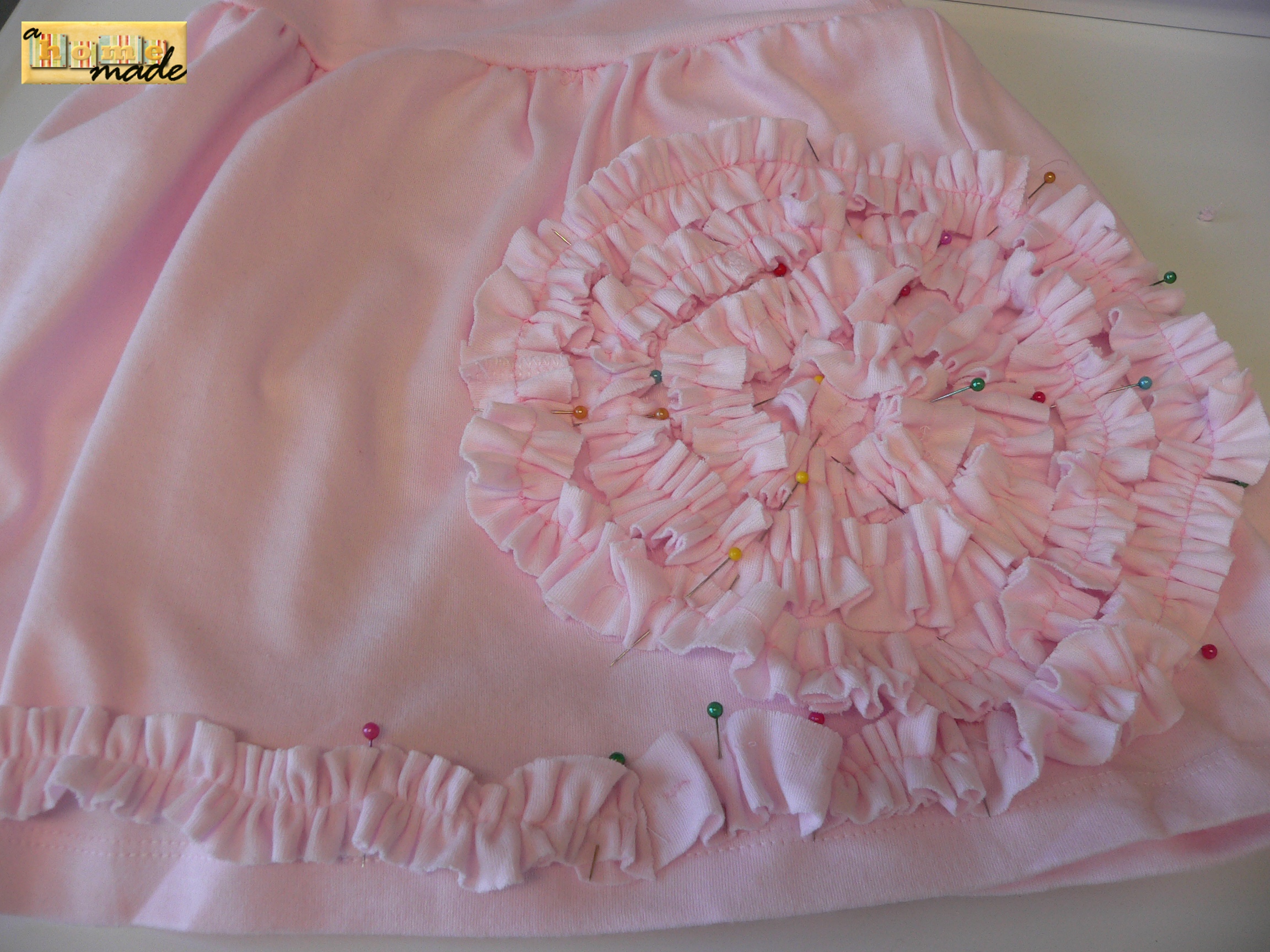 finish the spiral and trim the skirt bottom with the ruffle.JPG