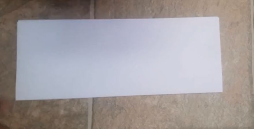 fold paper in half.JPG