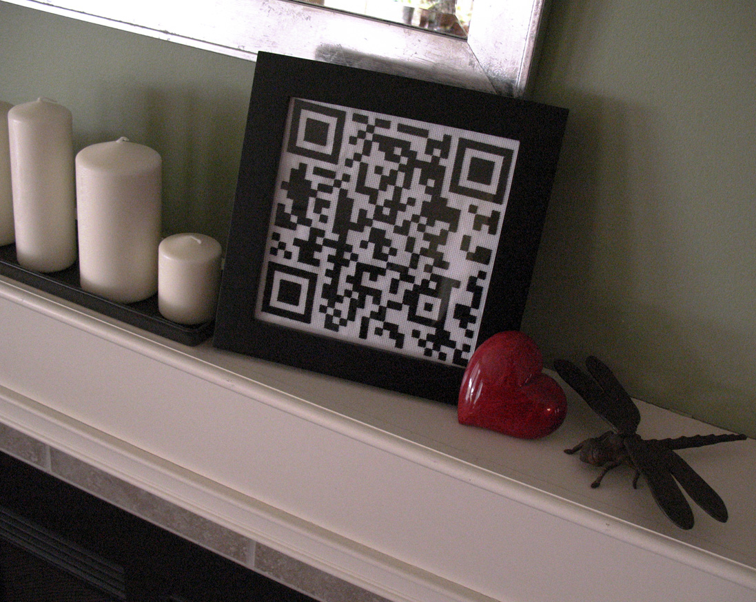 framed qr love note on mantel.jpg