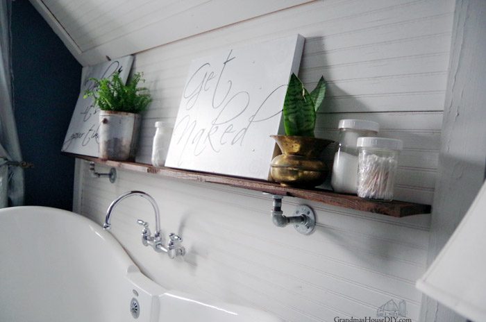 galvanized-pip-shelf-bathroom-storage-diy-700x464.jpg