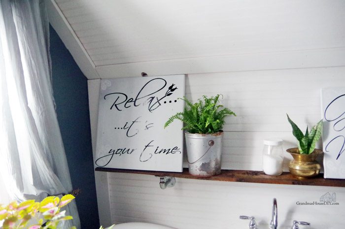 galvanized-pip-shelf-storage-diy-700x464.jpg