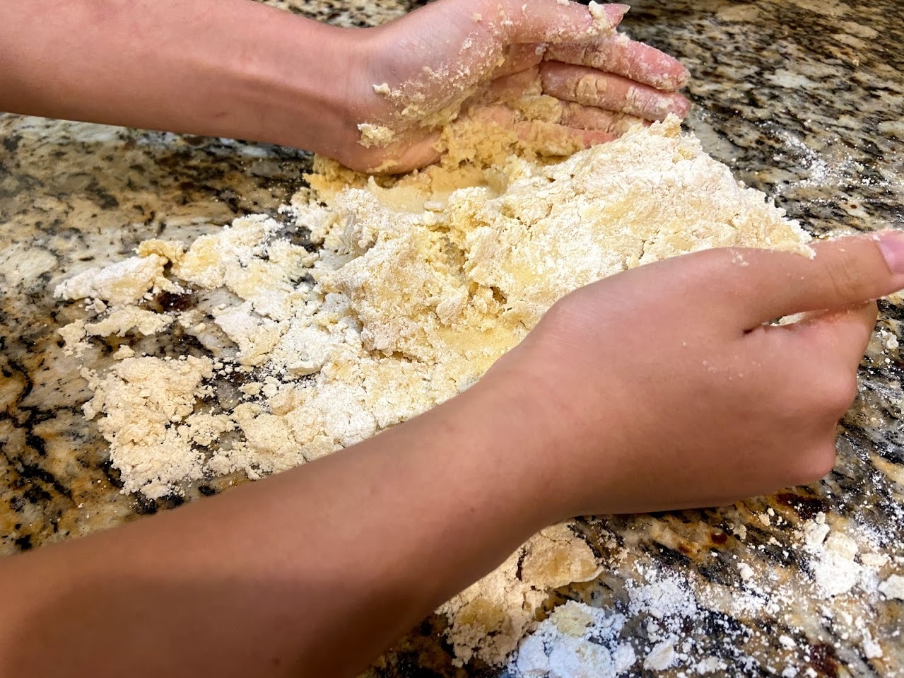 gathering dough on surface.jpg