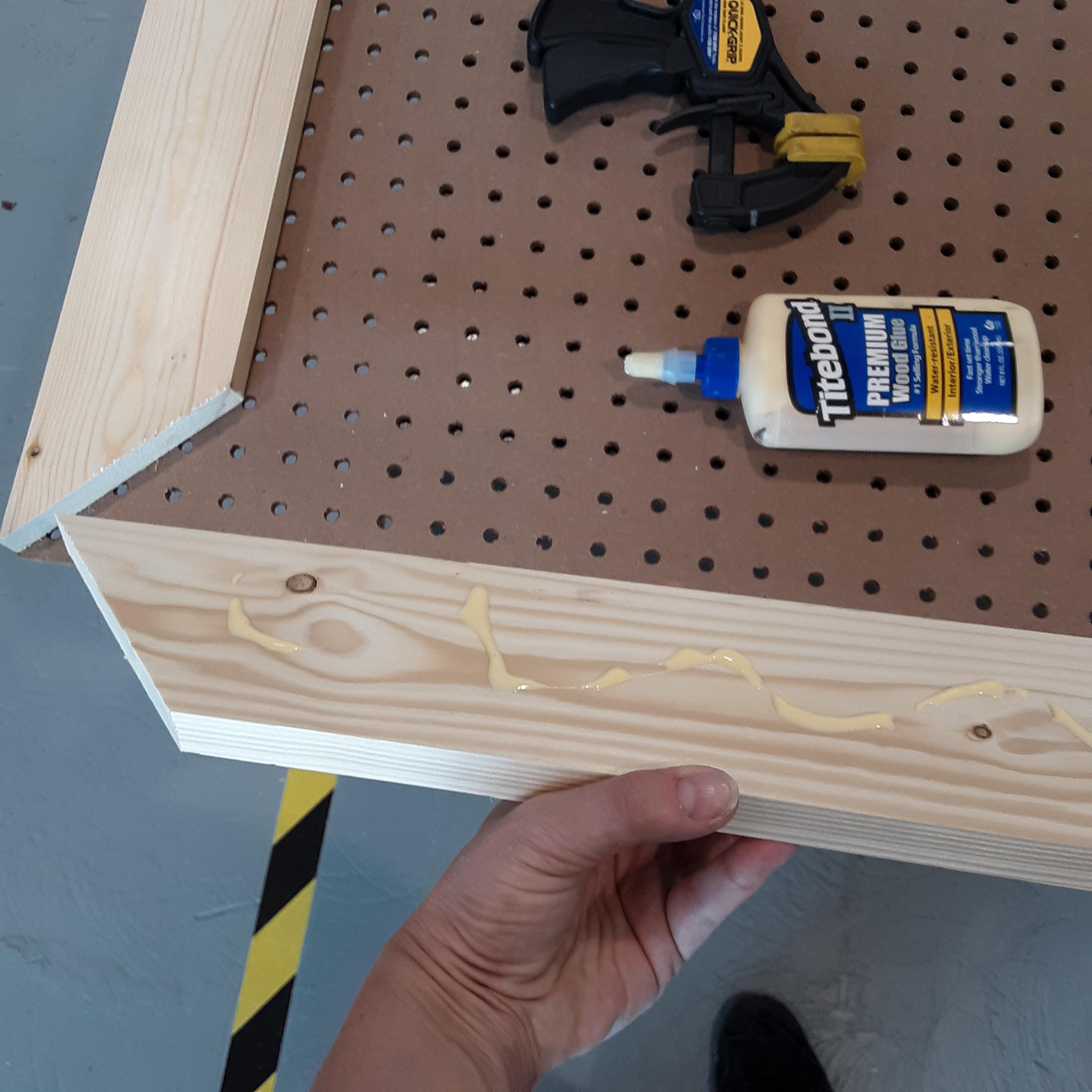 glue wood frame to back of pegboard.jpg