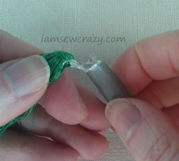 gluing thread bundle inside pen cap.jpg