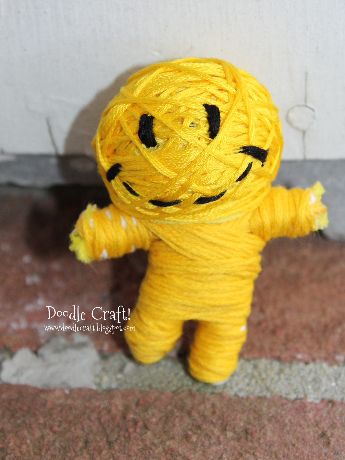 happy face smile string doll.jpg