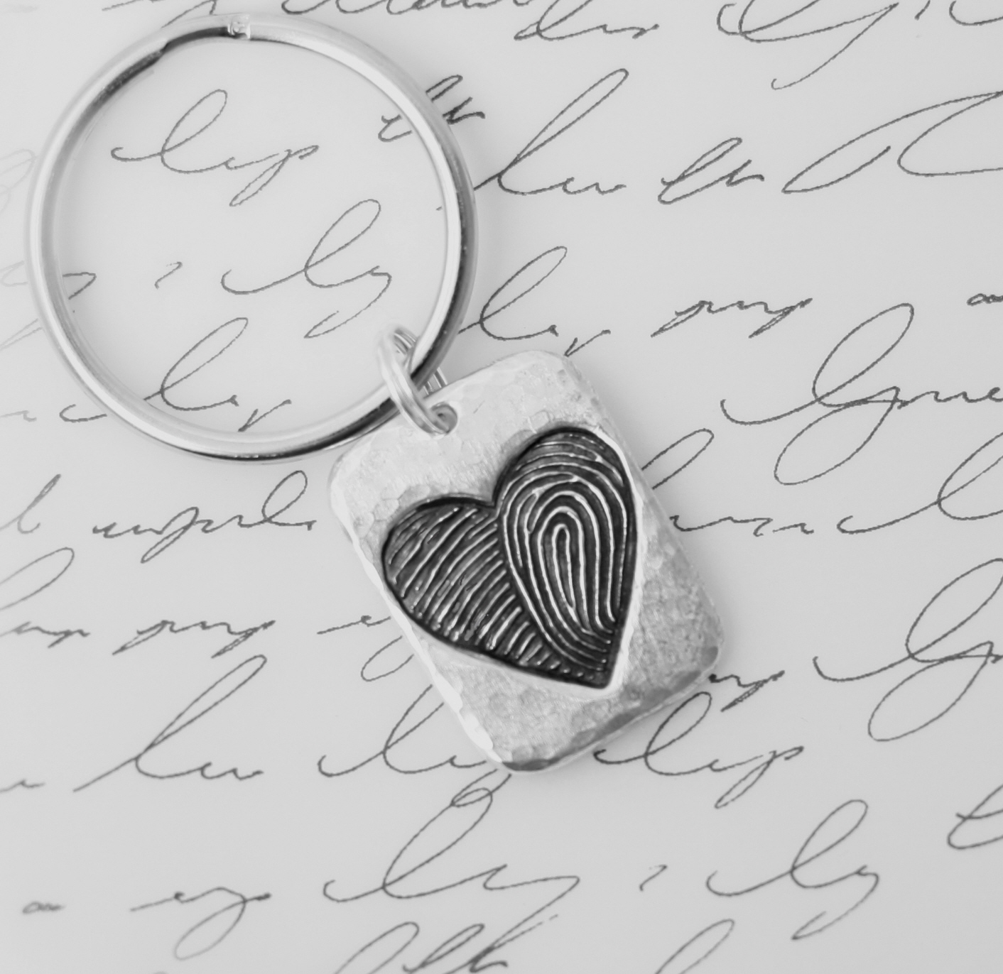 heartprint keyring on writing.jpg