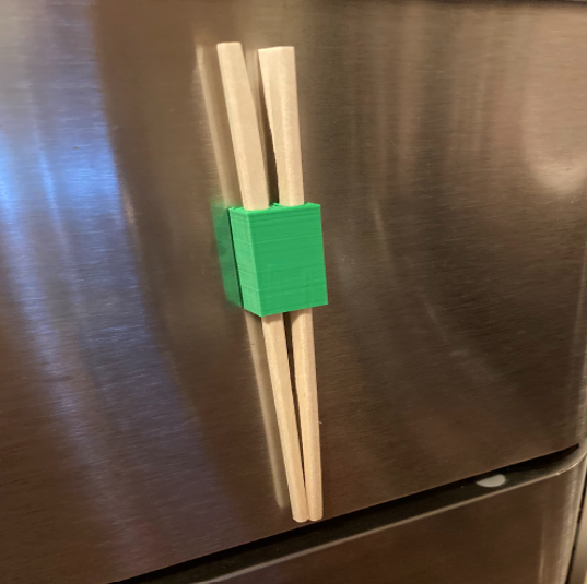 holder mounted onto fridge.png