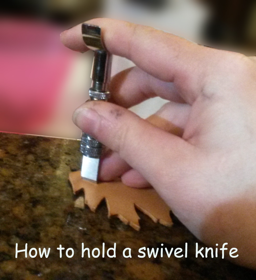 holding swival knife.jpg