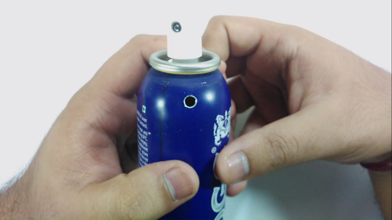 hole in the can.jpg