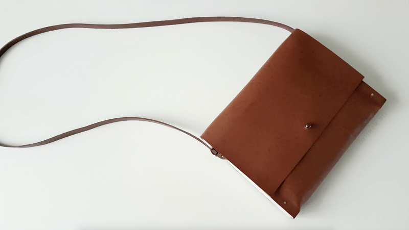 how tomake a small leather handbag minimalist look with wood sides by saltymom.net.png