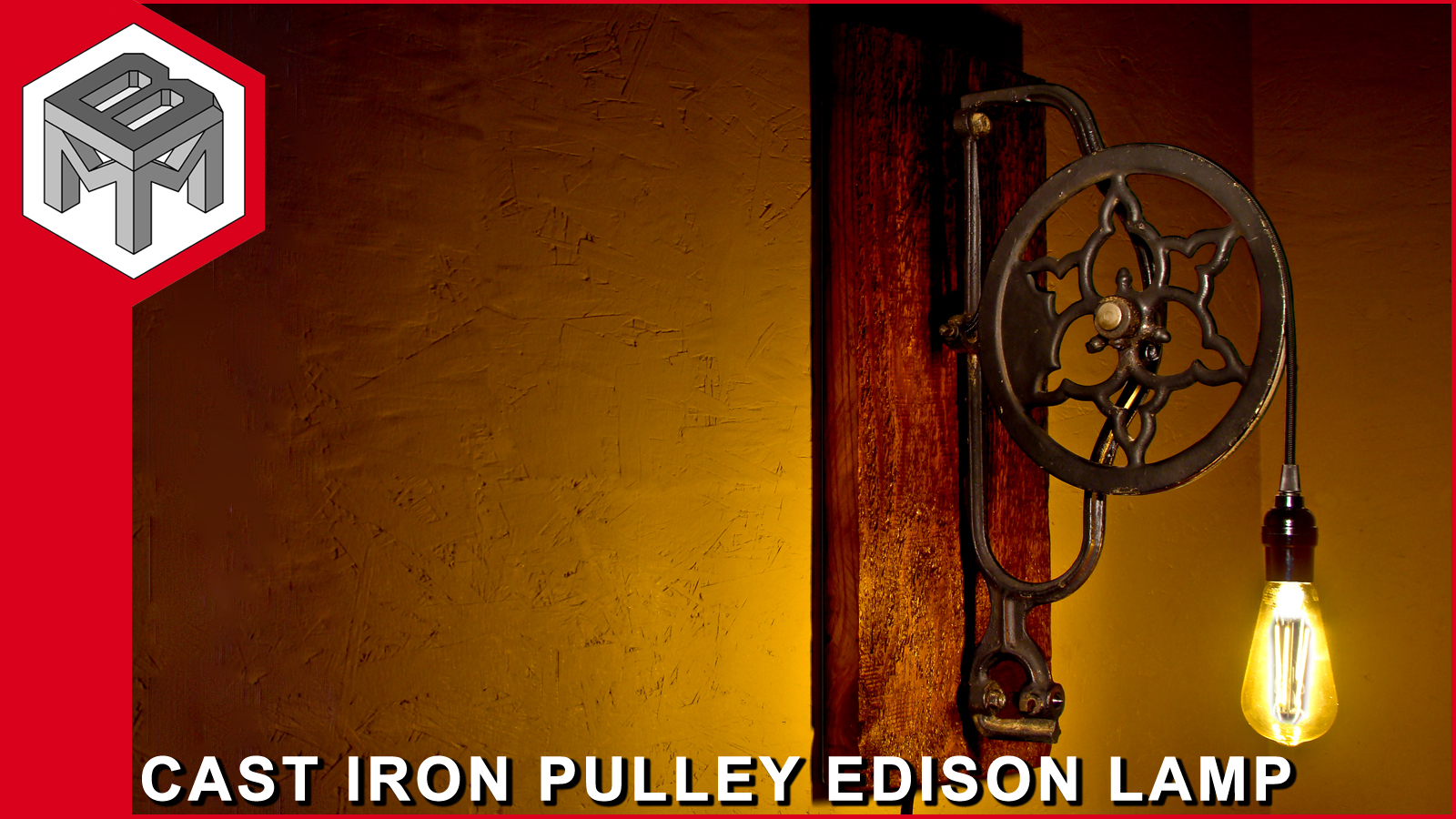 industrial-cast-iron-pulley-and-wood-edison-lamp.jpg