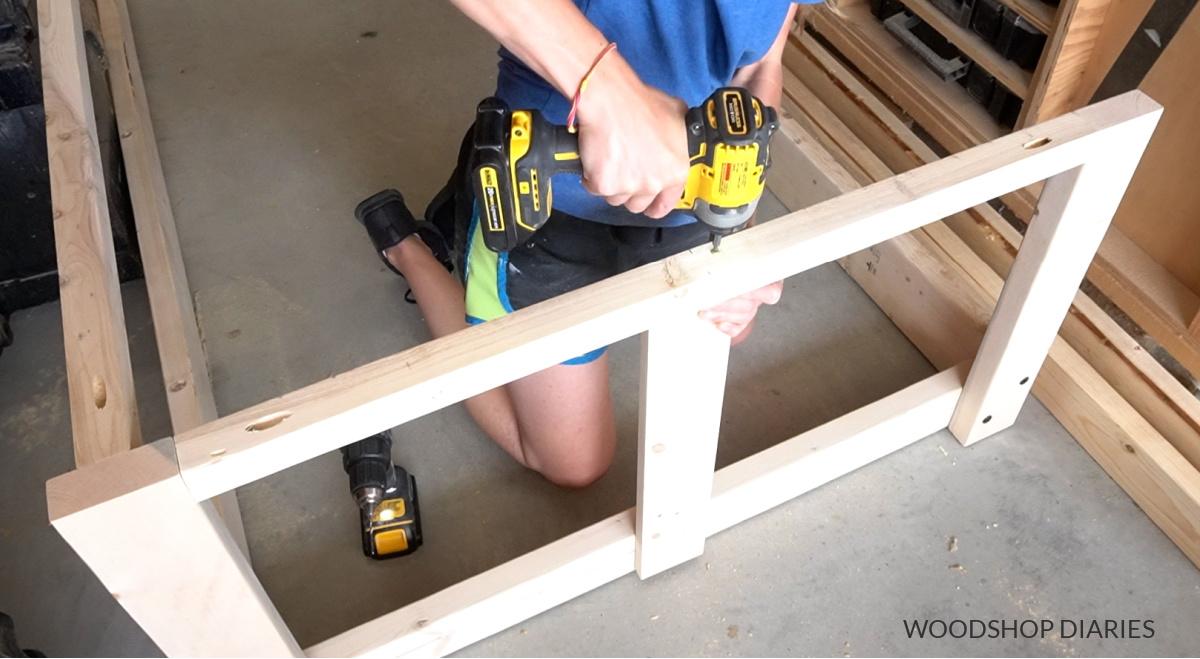 install slats into swing bed frame.jpg