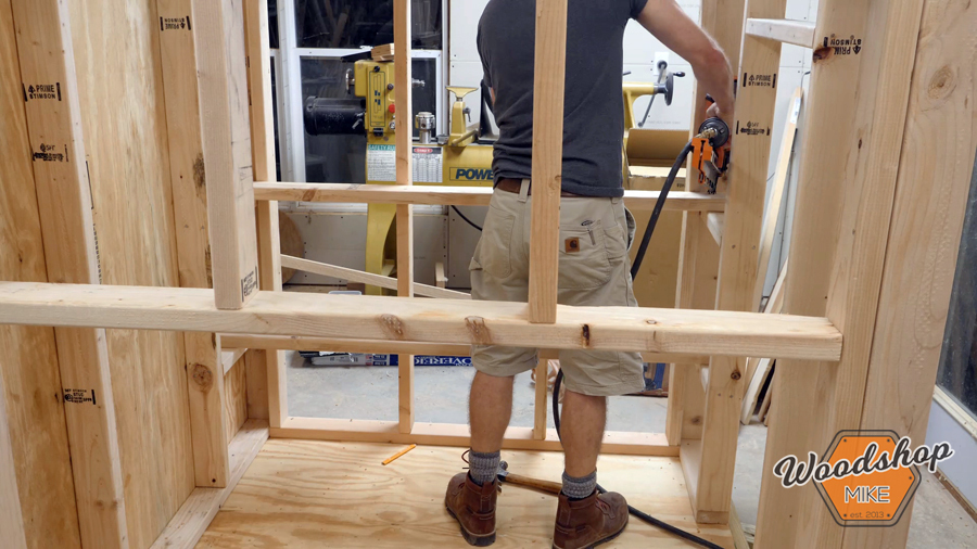 installing roosting rails _ How to make a DIY chicken coop.jpg