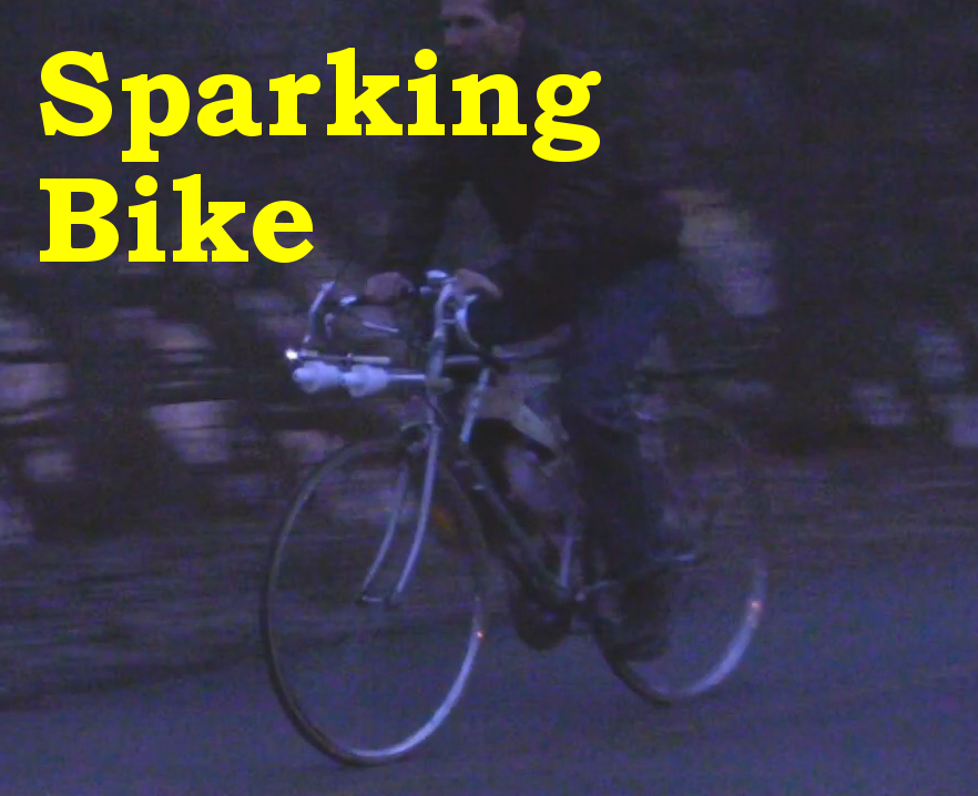 intro_sparking_wimshurst_on_bike_long_shot_an.jpg