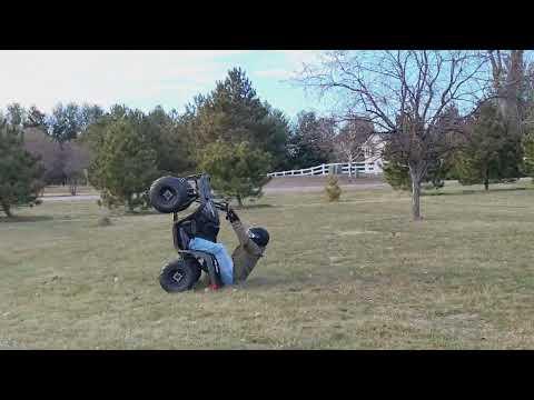 kids Polaris Sportsman 90 EV QS138 70H V2 electric quad conversion built by Patrick Basten -wheelie