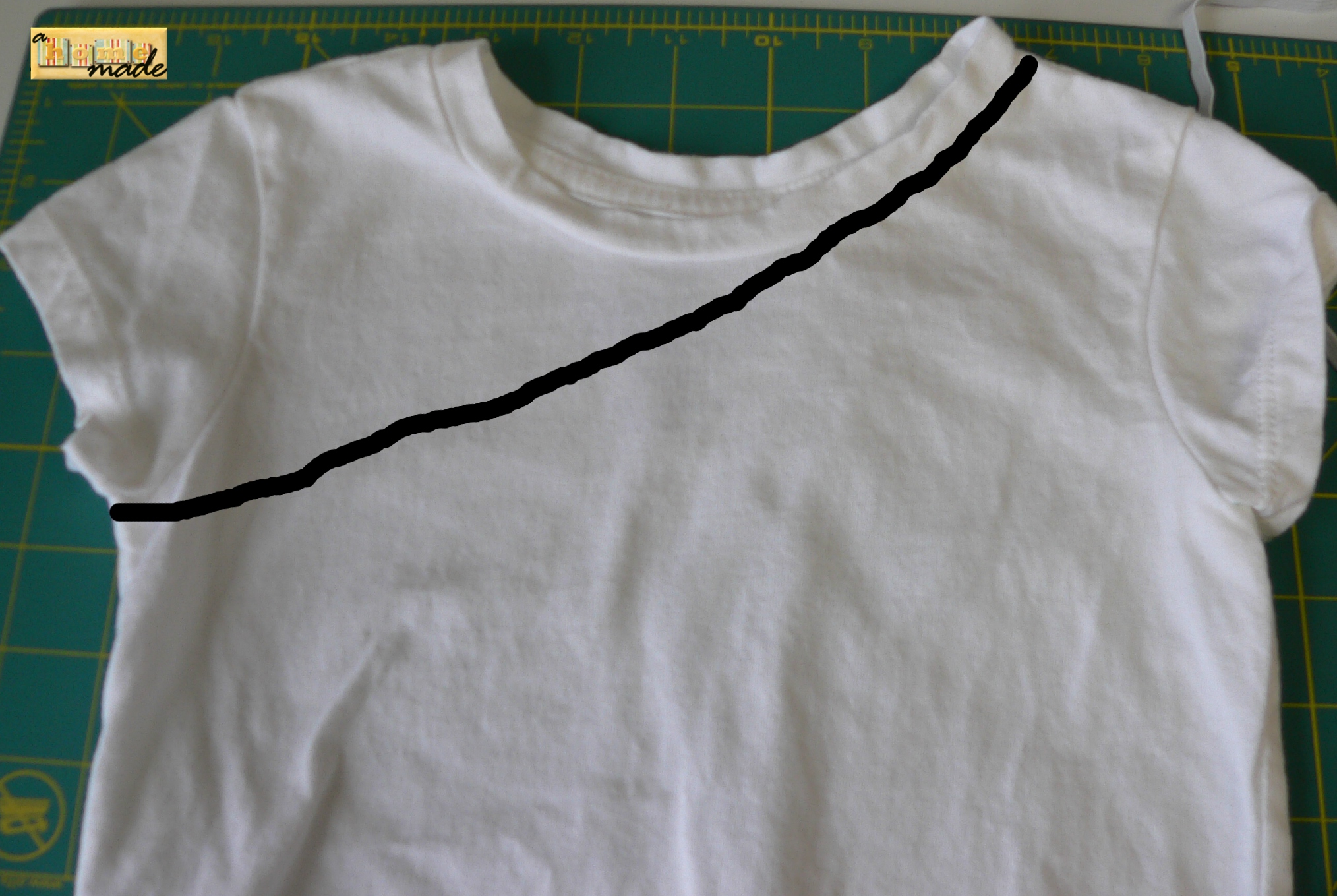 lay out tee flat and cut from neck to under shoulder on opposite sides.JPG