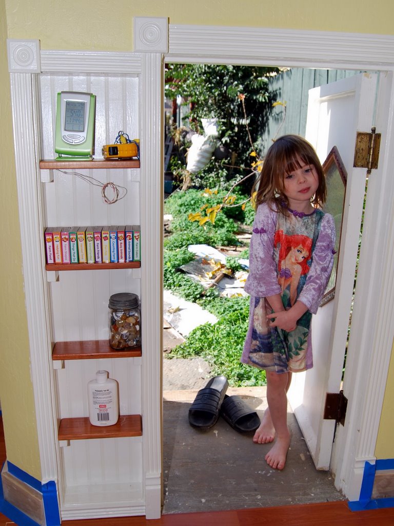 leila and bookshelf.jpg