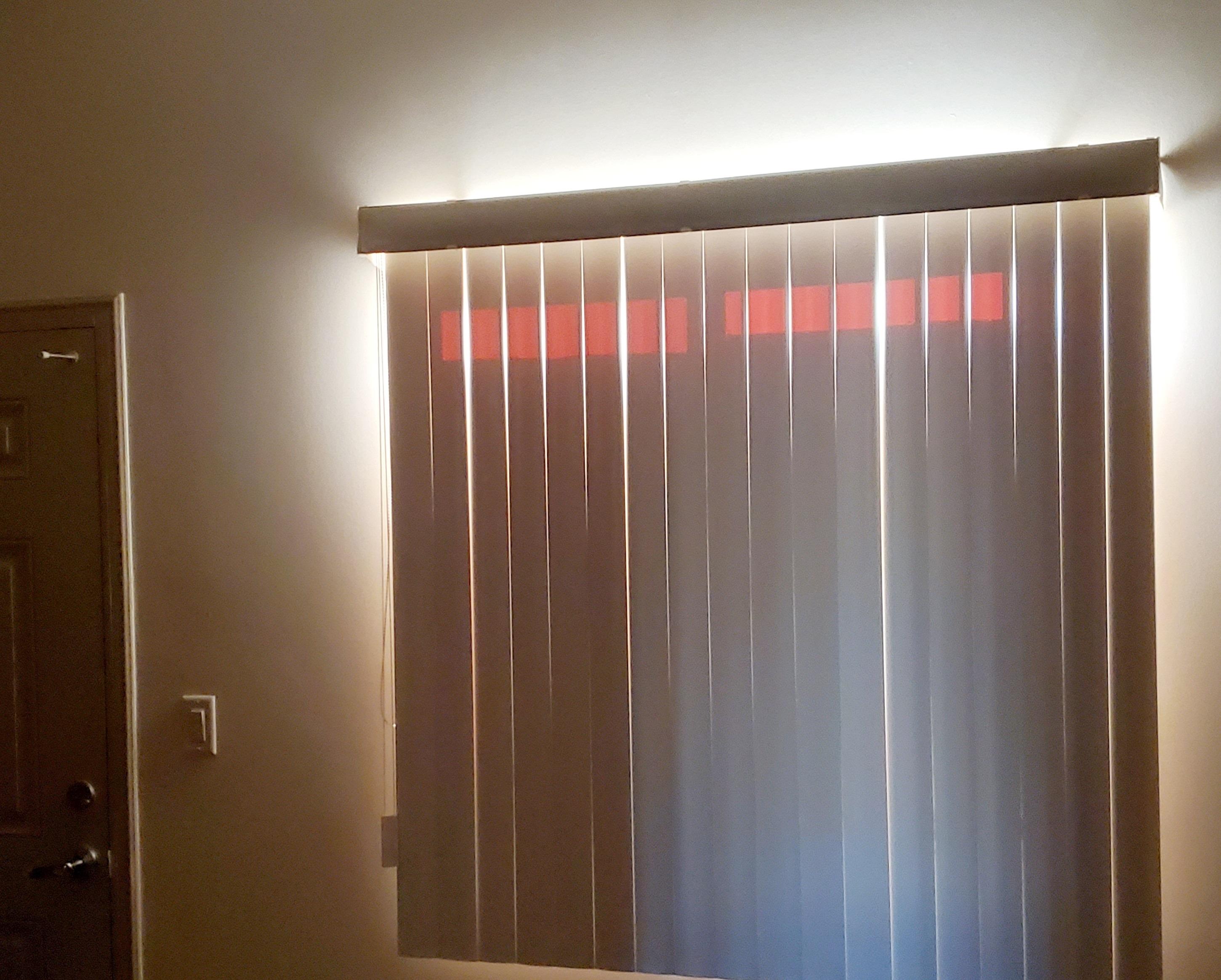 light shining through blinds at the top.jpg