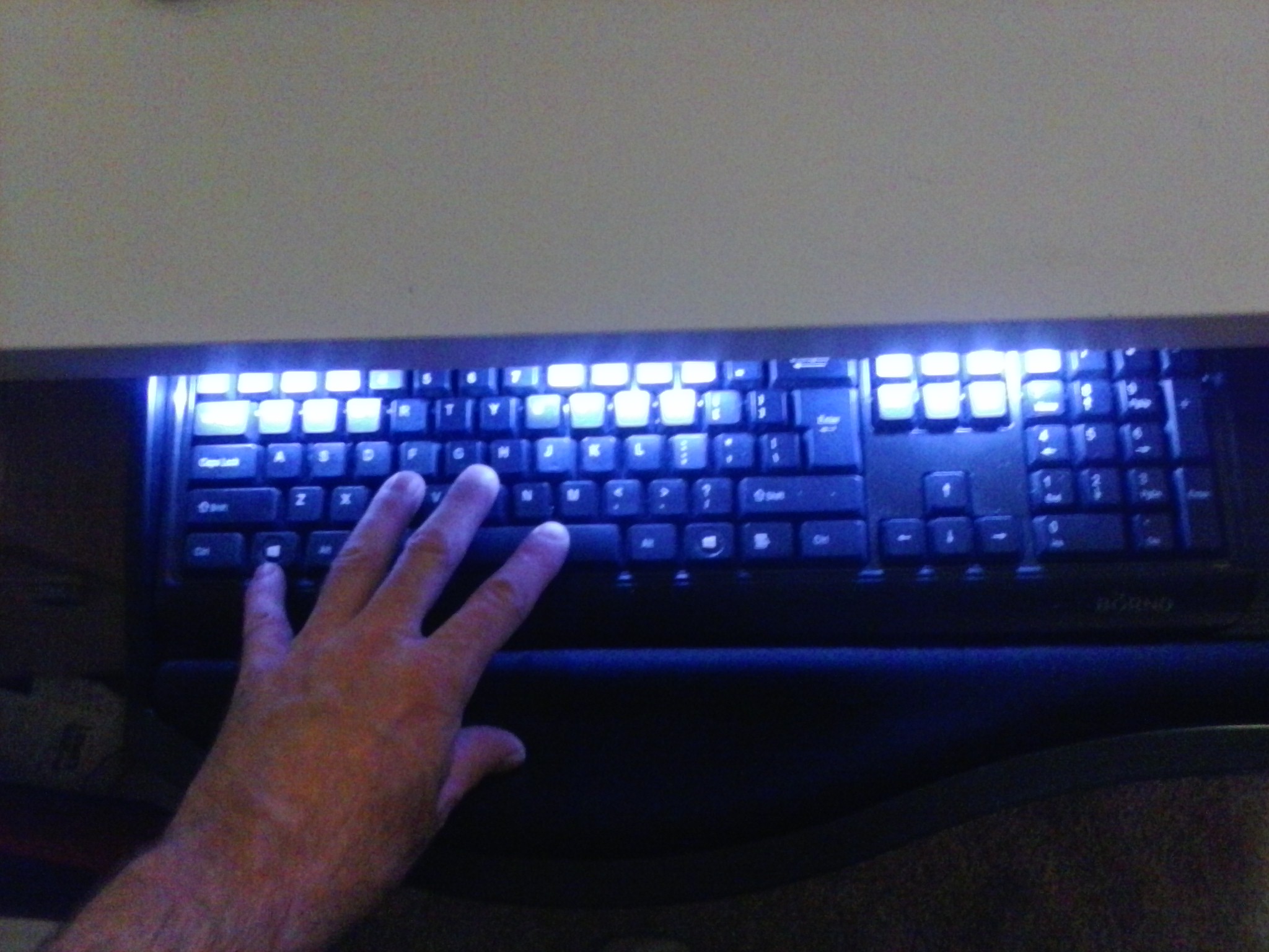 light up keyboard with hand.jpg