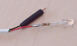 light_solder_resistor_to_LED_small.jpg