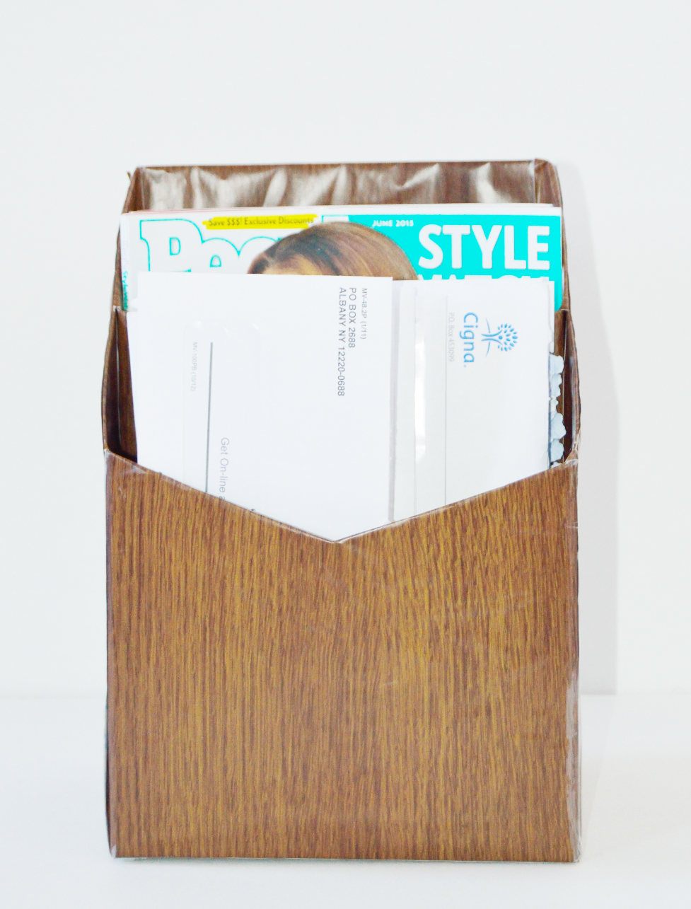 magazine holder cereal box covered with contact paper.jpg