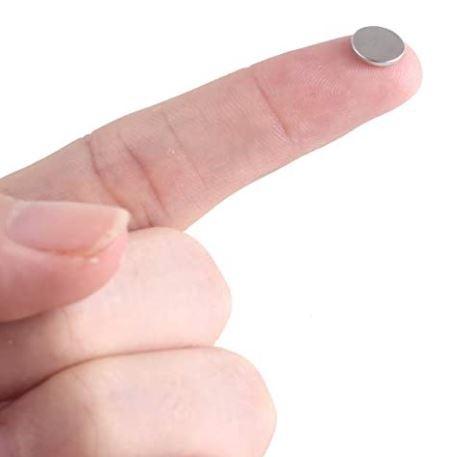 magnet on finger.JPG