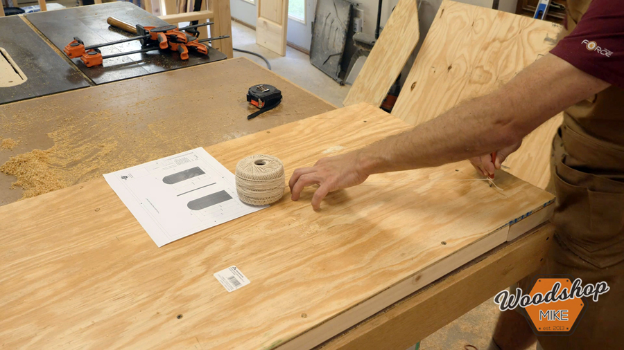 making arc with string _ How to make a DIY chicken coop.jpg