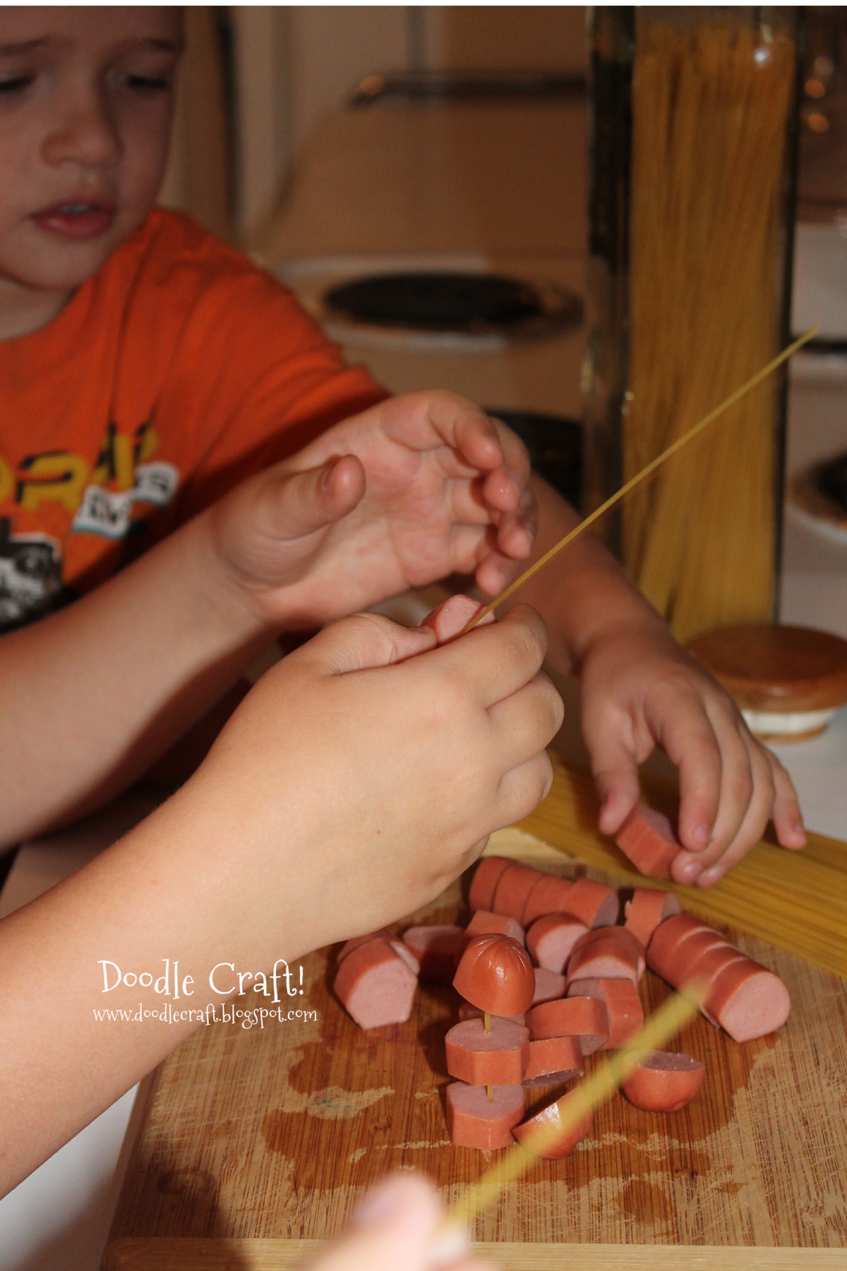 making hot dog meatball spaghetti with kids.jpg