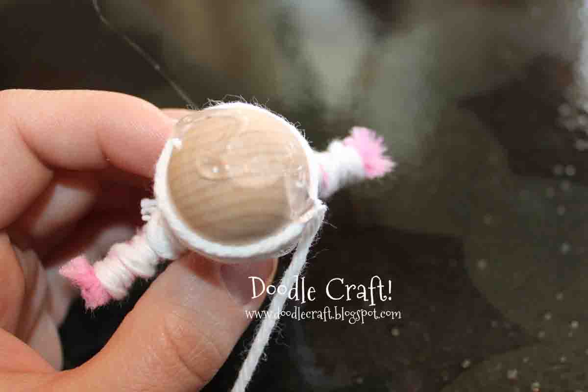 making string dolls.jpg