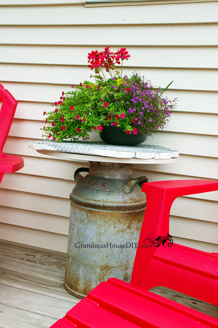 milk-can-end-table-outside-deck.jpg