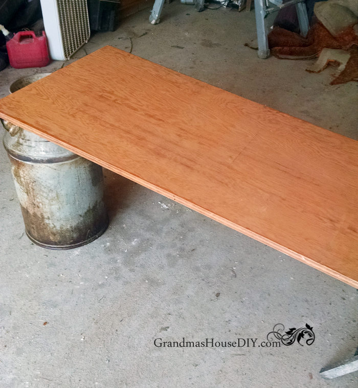 milk-can-plywood-table-barn.jpg