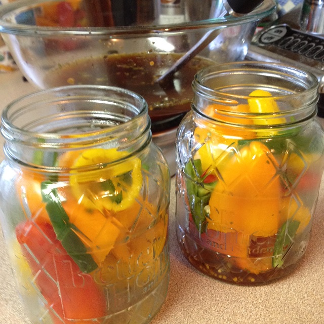 mini sweet peppers in jar waiting for brine.JPG