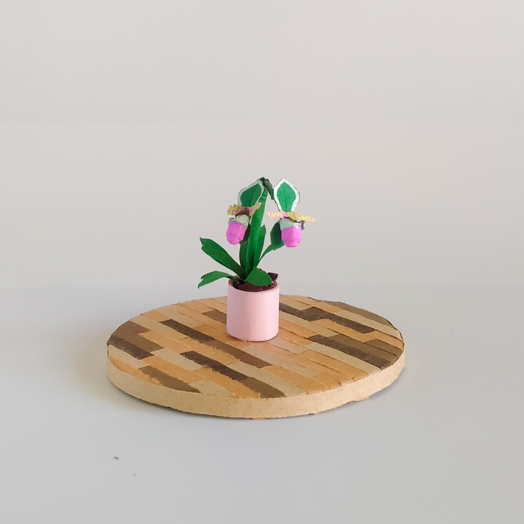 miniature orchid by quinzy varira.png