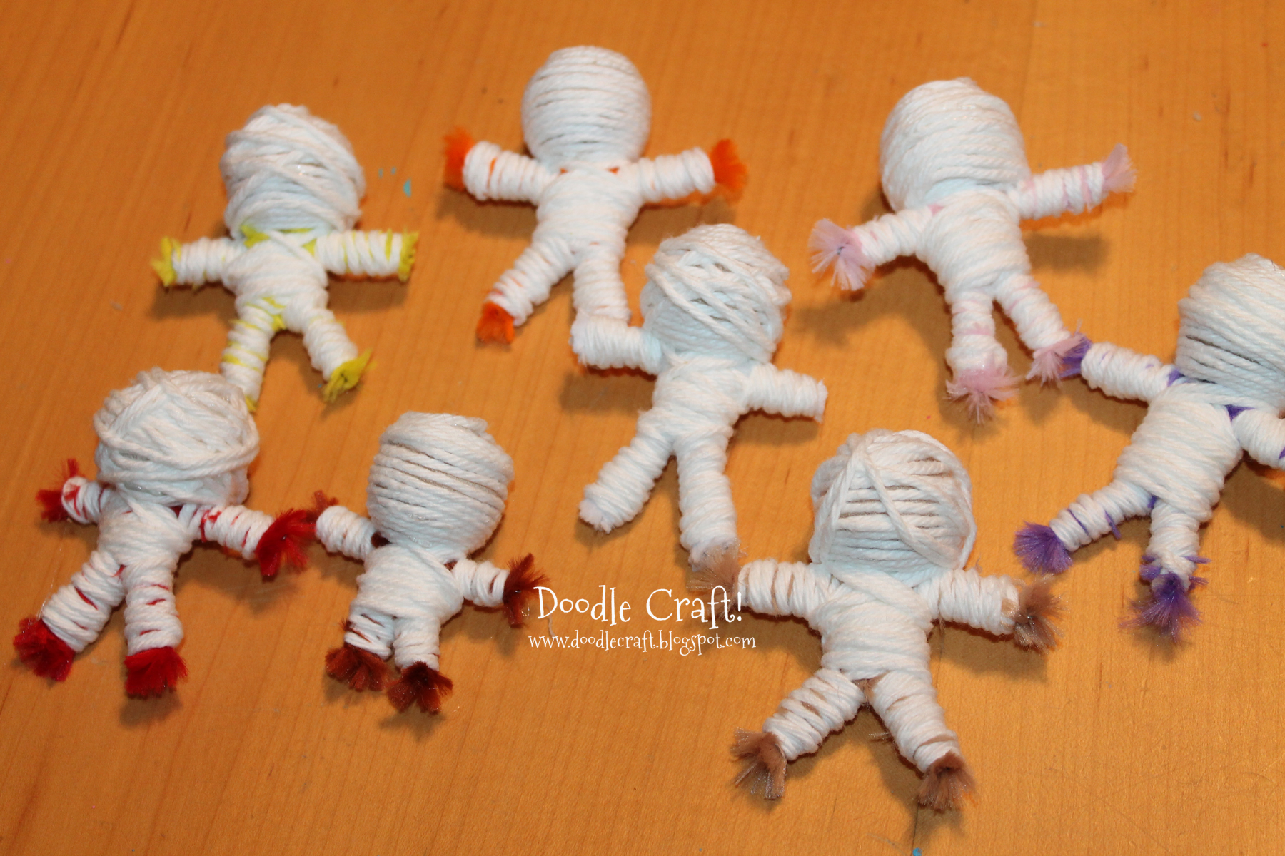 mummy bodies string yarn dolls.jpg