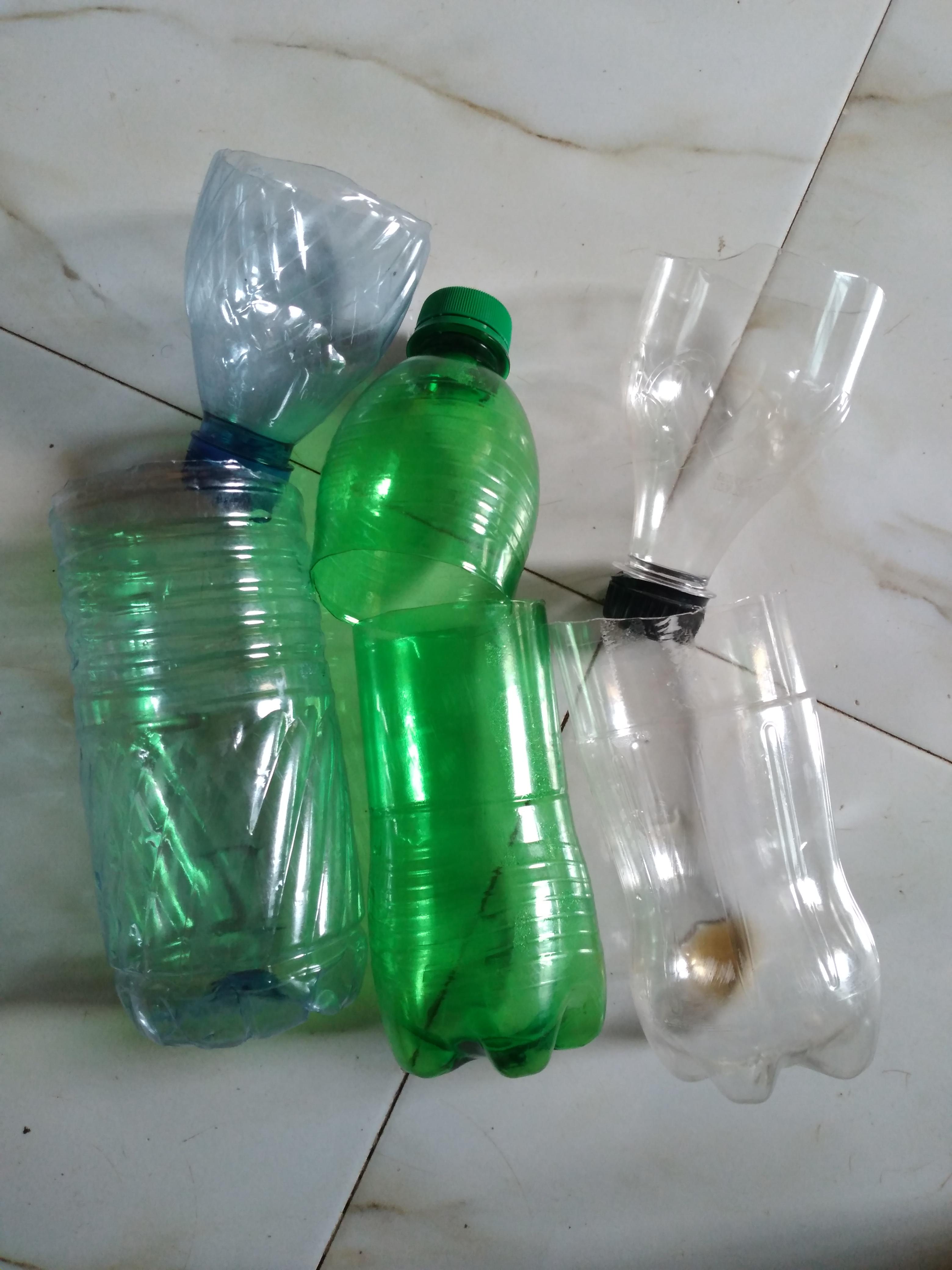 nifty plastic trash diy cheap no cost self watering (31).jpg