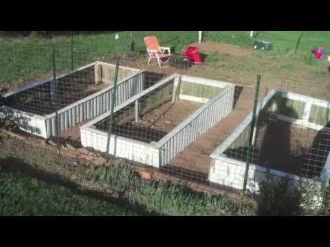 old cedar fence becomes raised planters