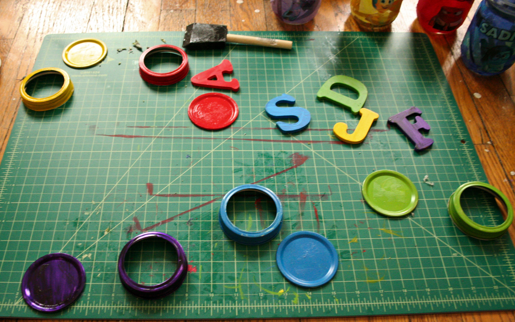 paint letters and jar lids.jpg