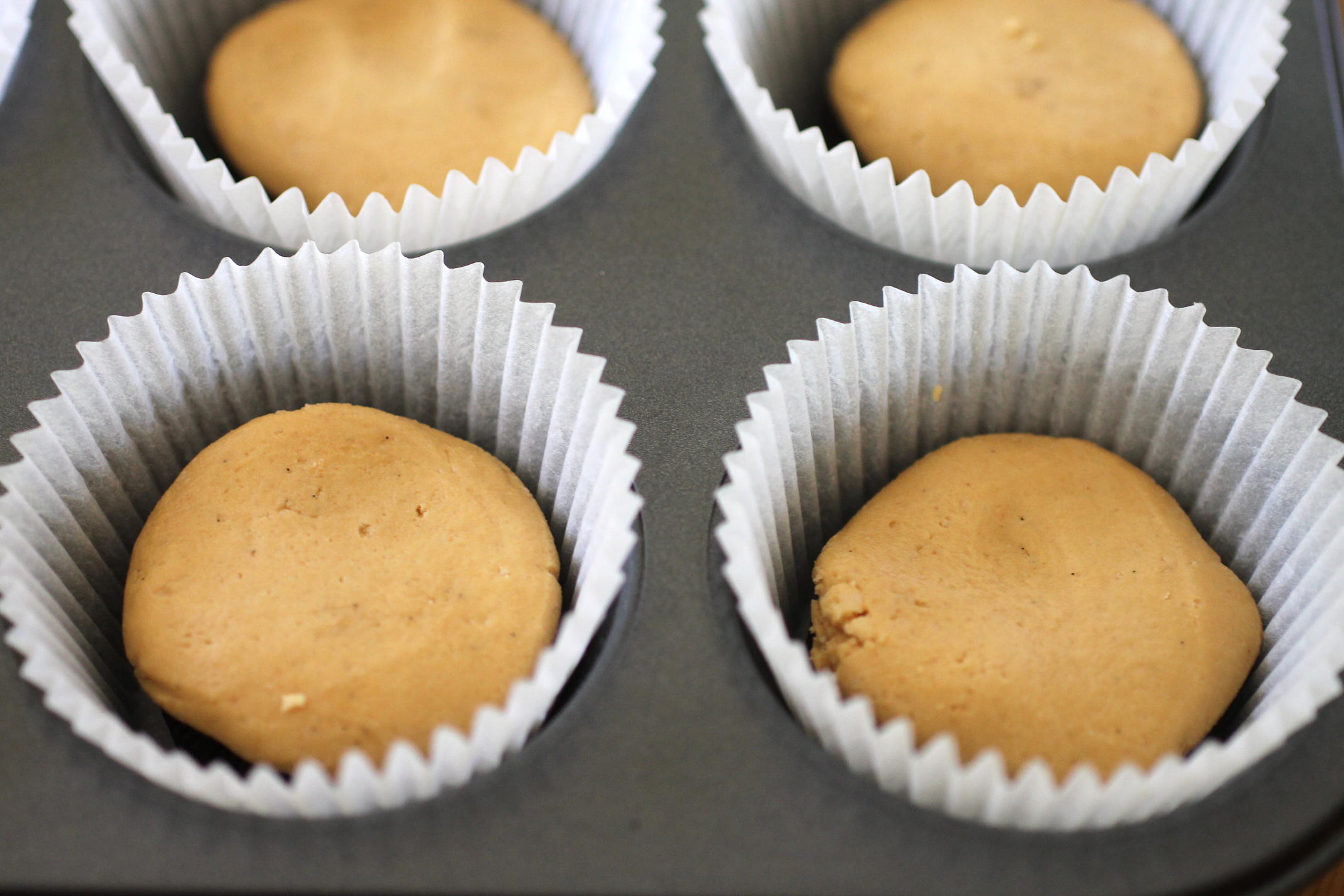 peanut butter mini baked cheesecakes oreo peanut butter cup bases.jpg