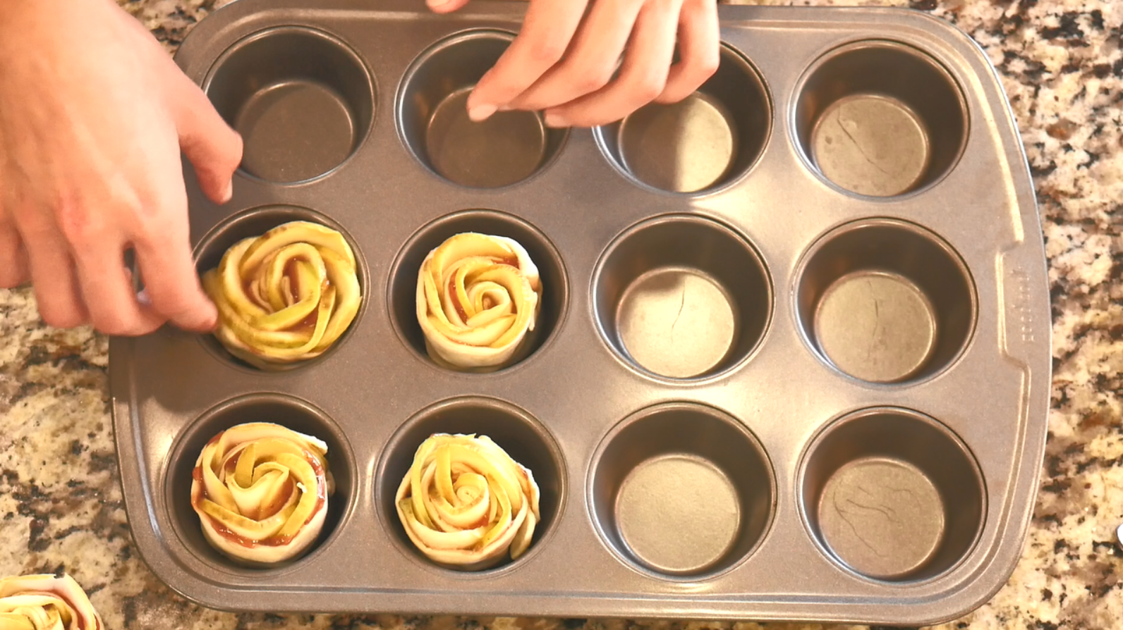 placing apples in muffin tins.PNG