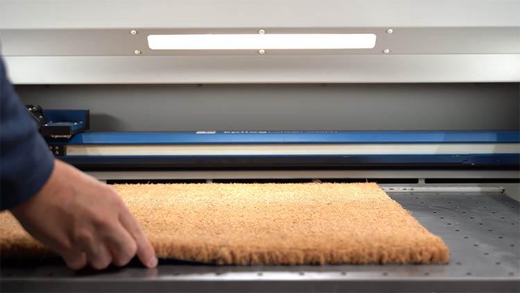 placing-the-coir-doormat-into-the-fusion-pro-laser.jpg