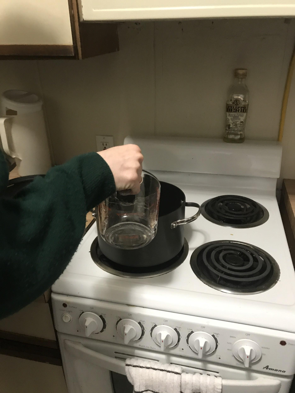 pot and water pouring .png