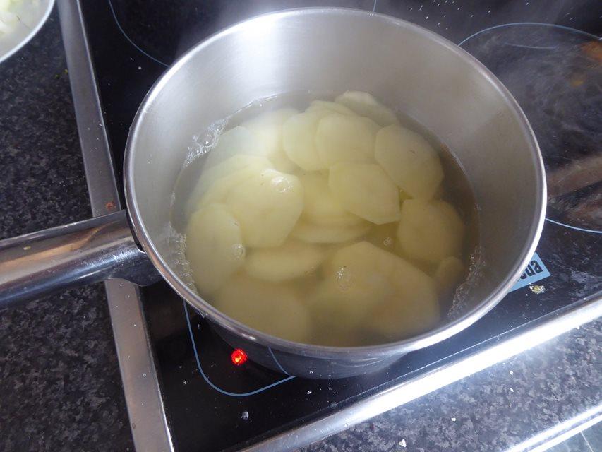 potatoes sliced in pan.JPG