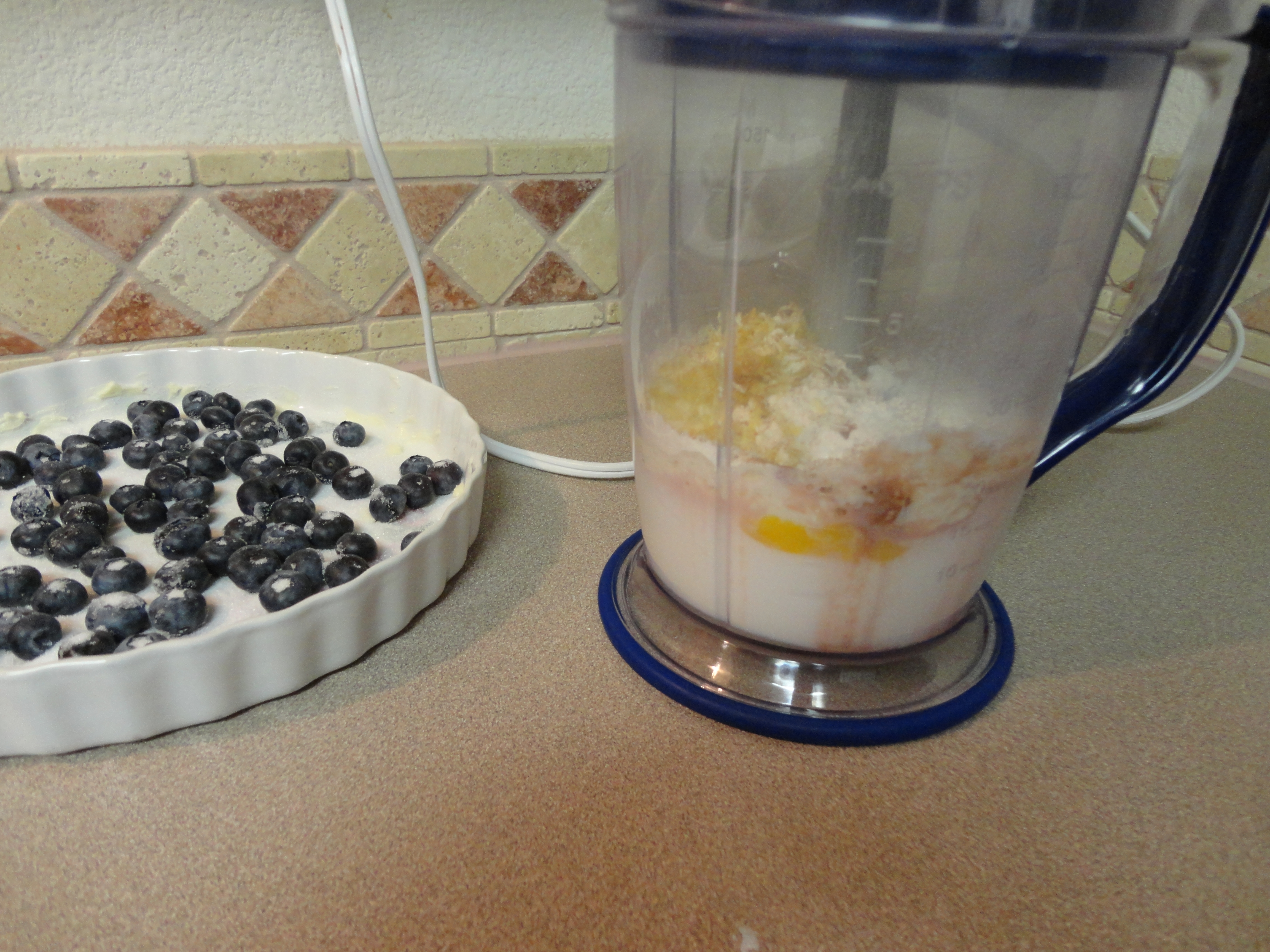 processing ingredients for the lmon Blueberry Flognarde.JPG