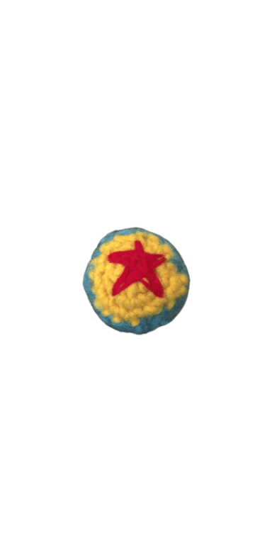 red-star-on-crochet-ball.png