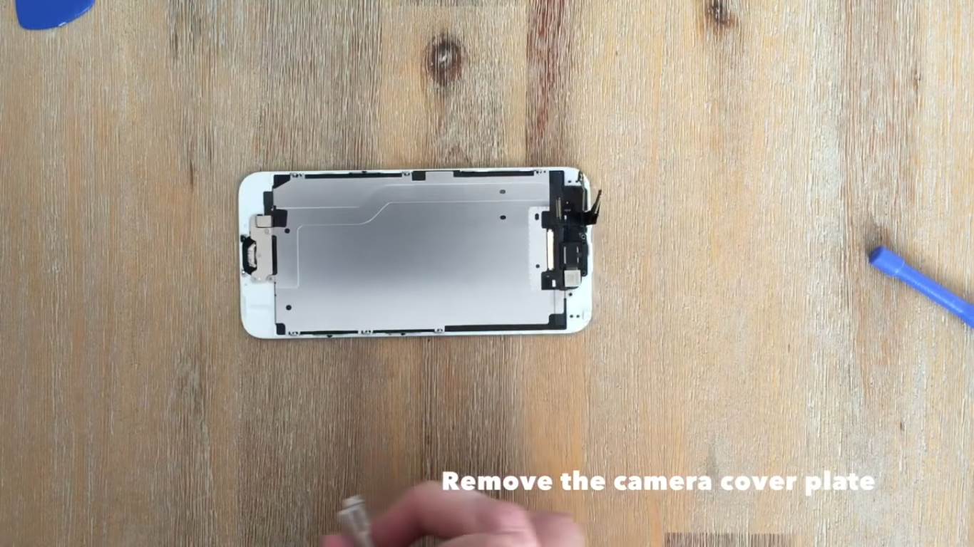 remove the camera cover plate.jpg