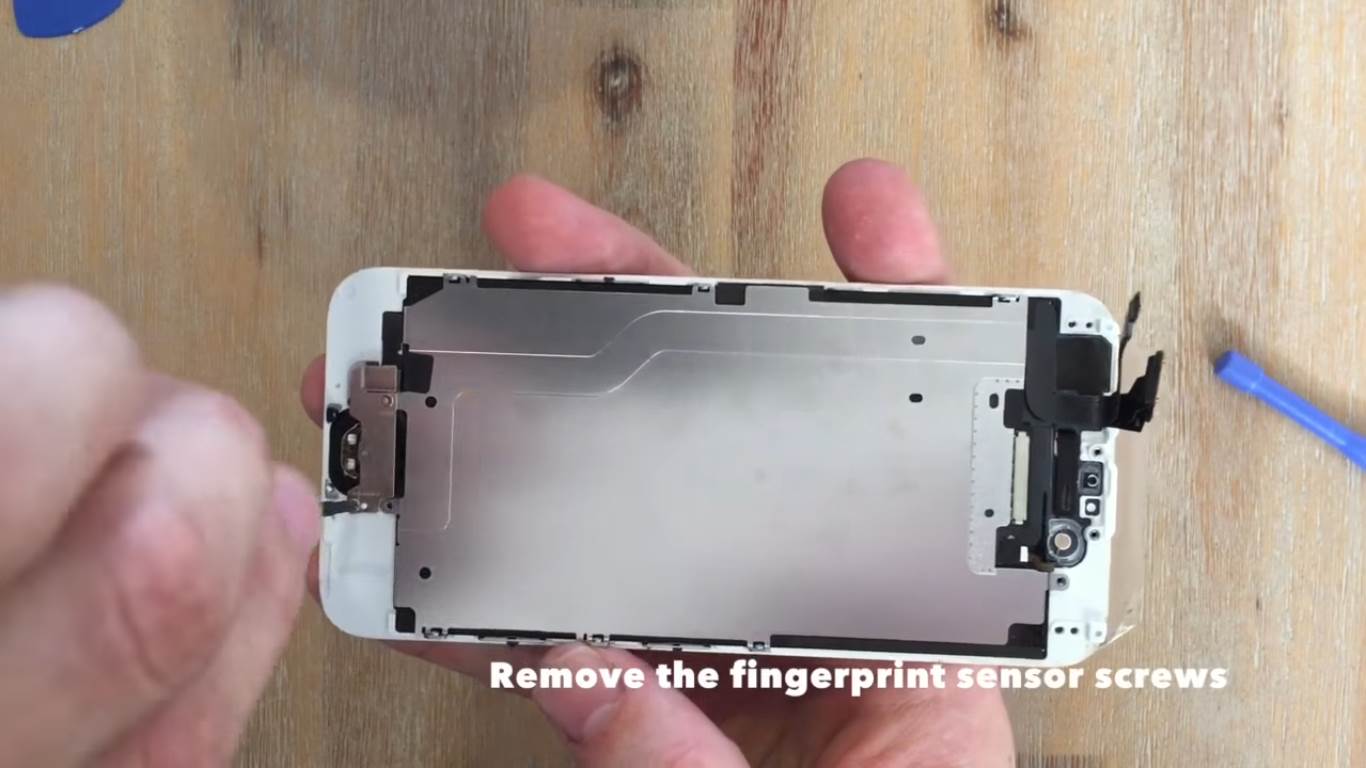 remove the fingerprint sensor screws.jpg