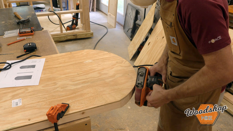 sanding door arc _ How to make a DIY chicken coop.jpg